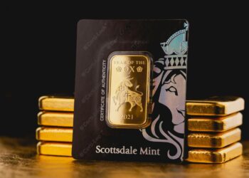 a stack of gold bars sitting on top of each other